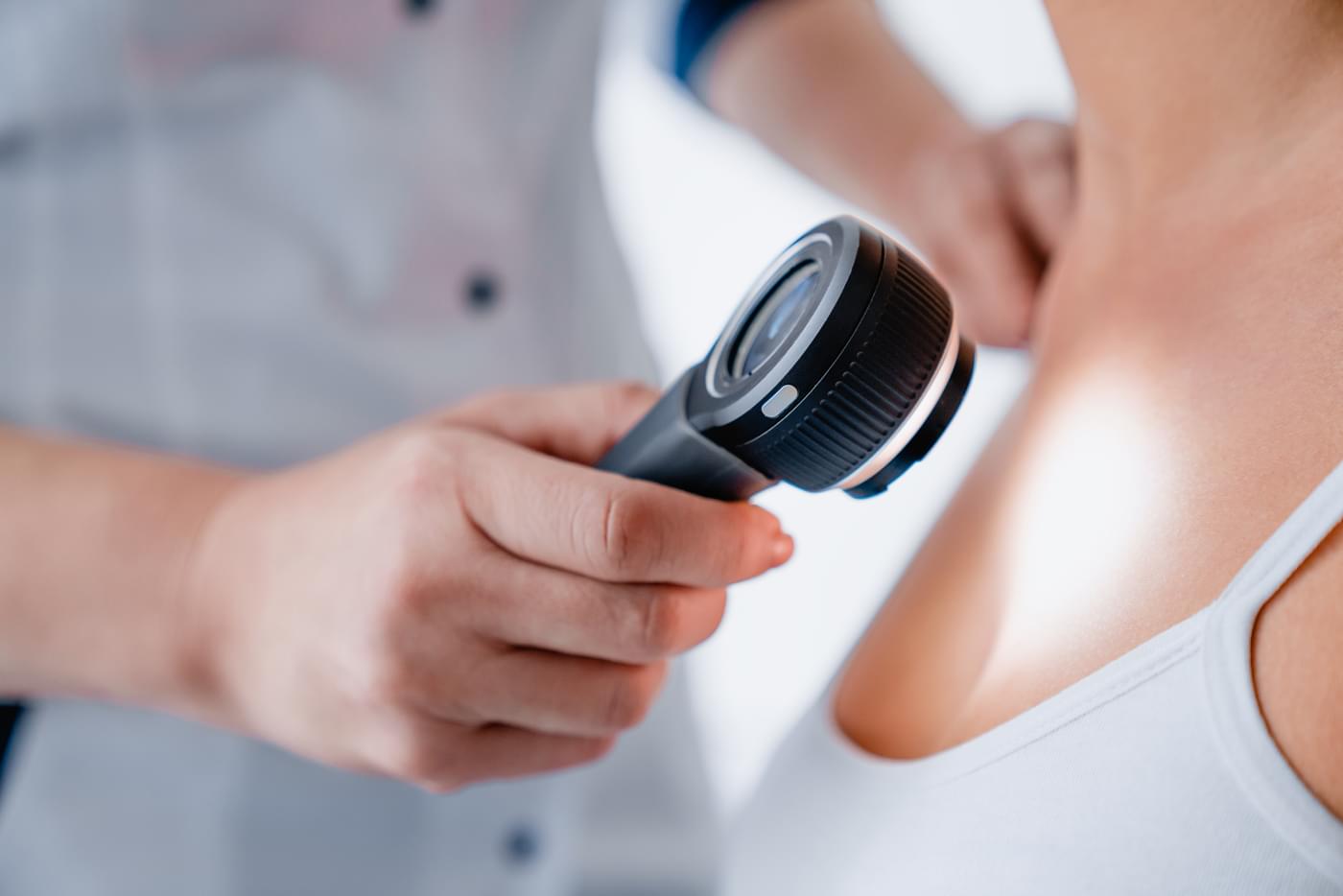 close up of female doctor checking skin of girl wi 2022 05 31 02 19 15 utc Omda 04